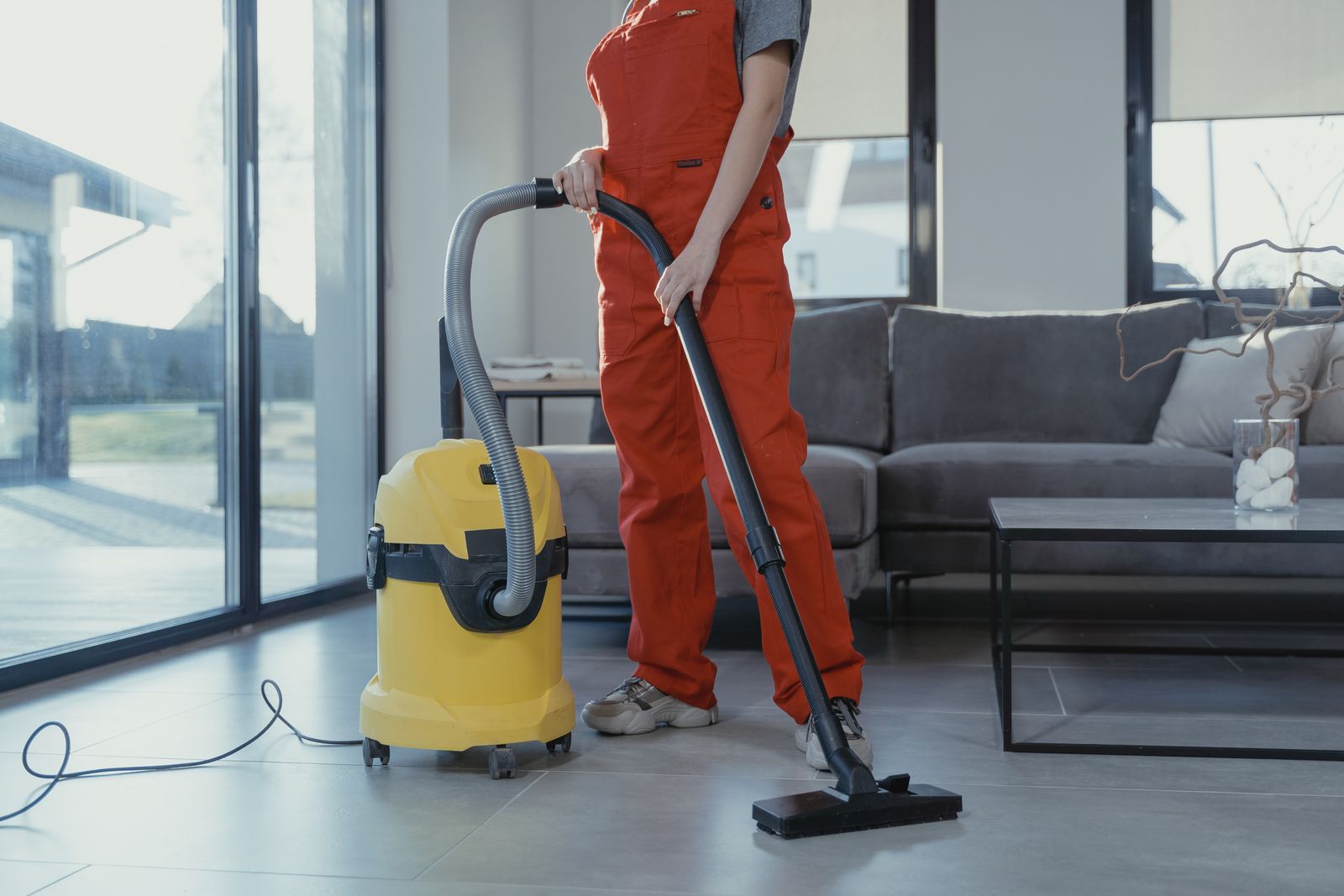 Maple &amp; Mop cleaner disinfecting a bright living room
